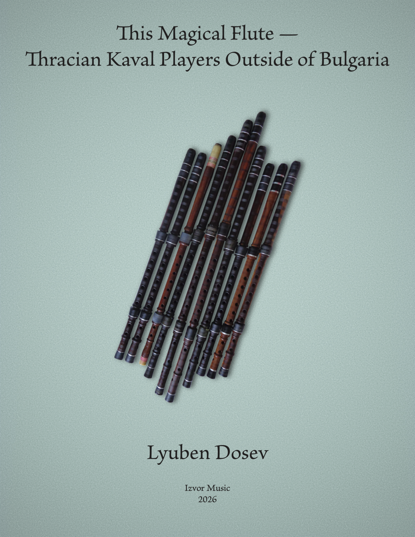 Image of cover of This Magical Flute book with picture of kavals on a green background